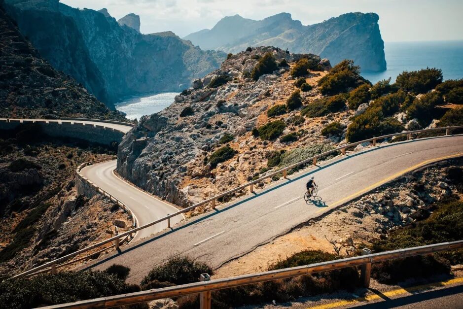Mallorca's Tramuntana coast at first light, the road threading between the cliffs and the sea