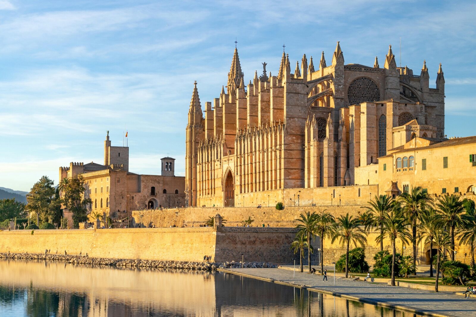 Palma at dusk, the cathedral lit against the bay