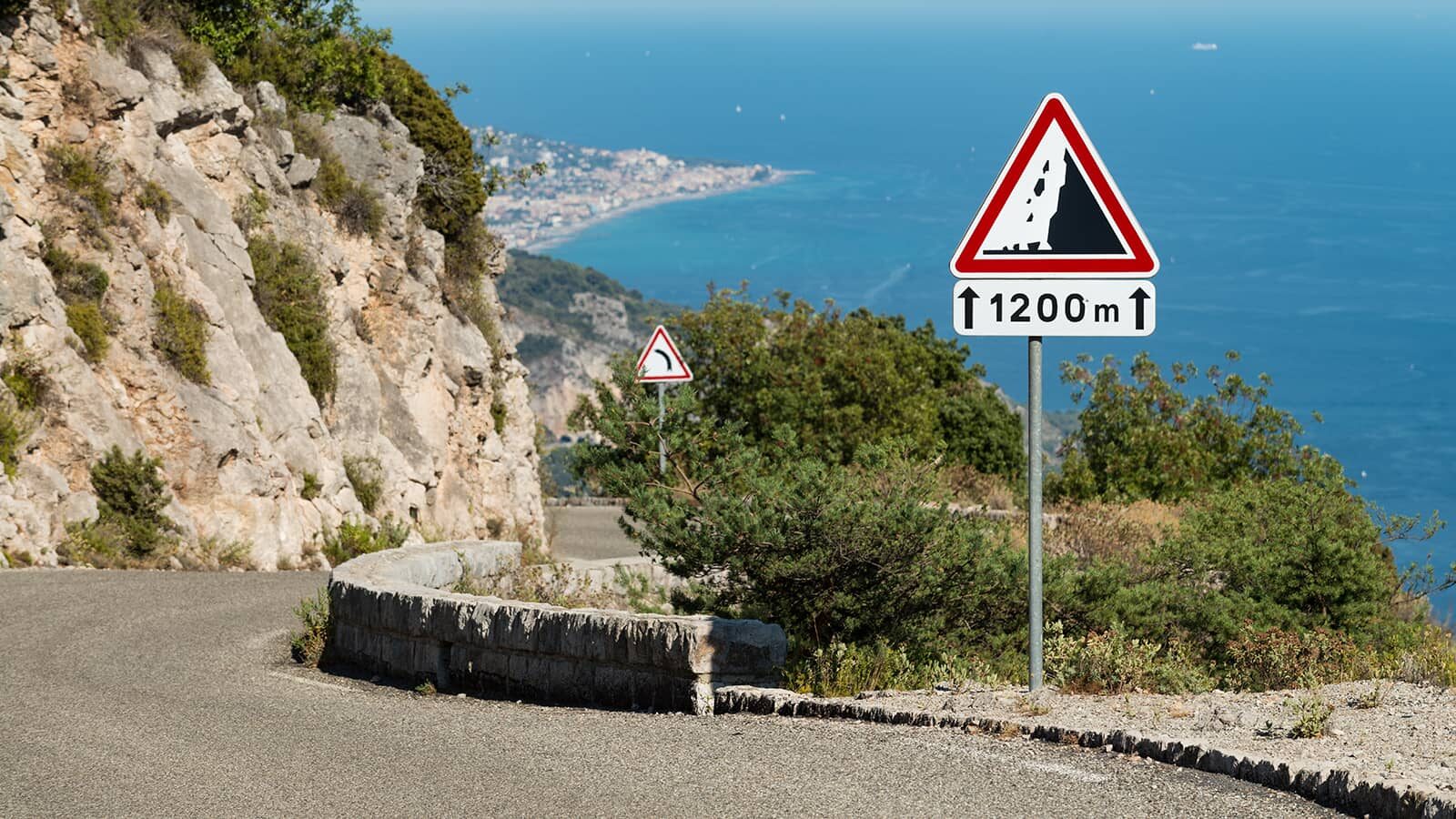 The narrow upper ramps of the Col de la Madone above Sainte-Agnès, the Mediterranean coastline far below